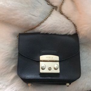 Selling this gently used Furla bag!